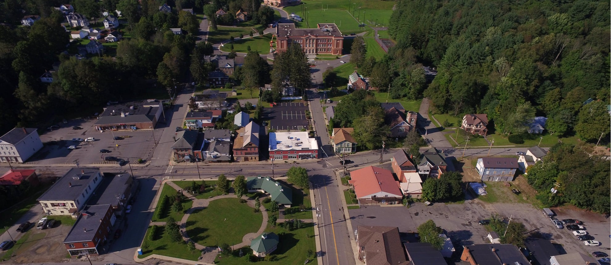 Images of different areas in the town of Hancock, New York including the Historic Village, and the Bouchoux Trails