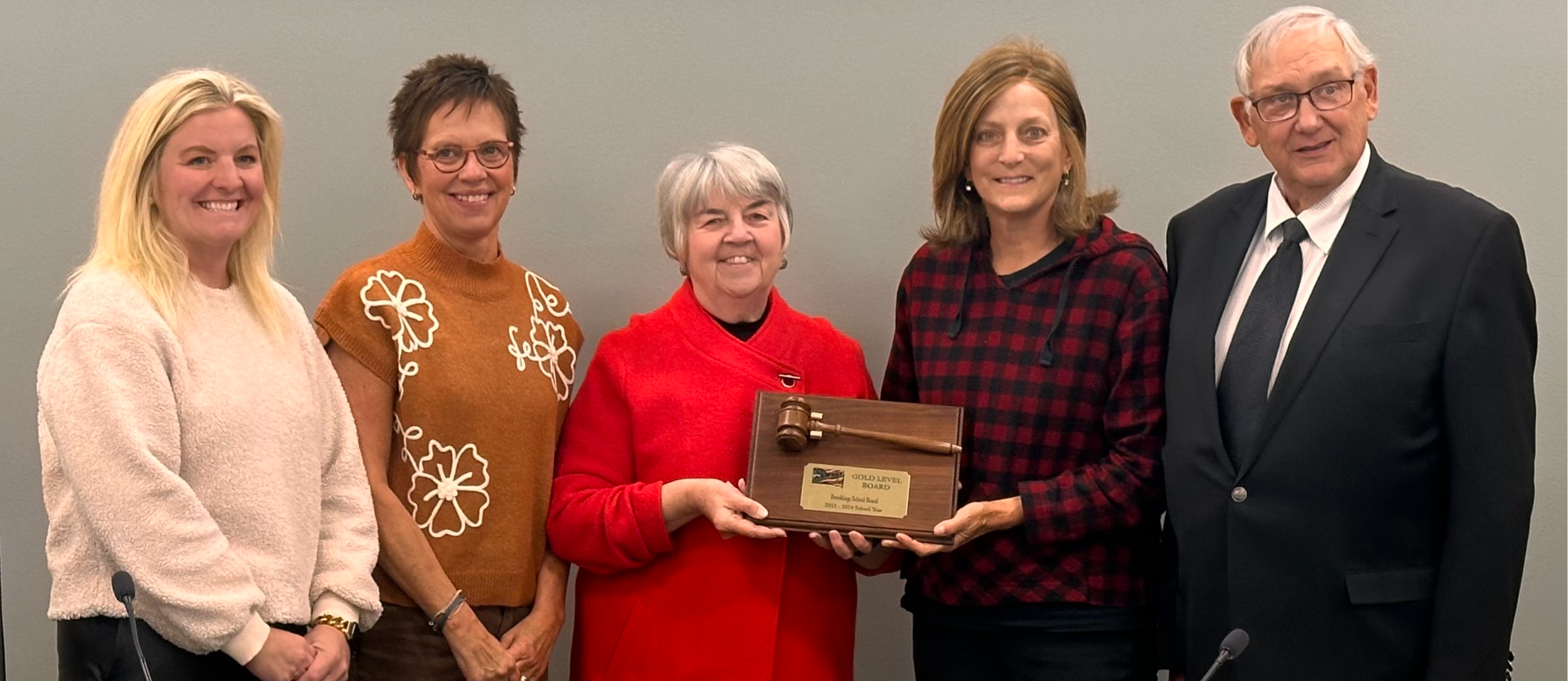 Image of school board receiving the associated school board of south dakota gold level award.