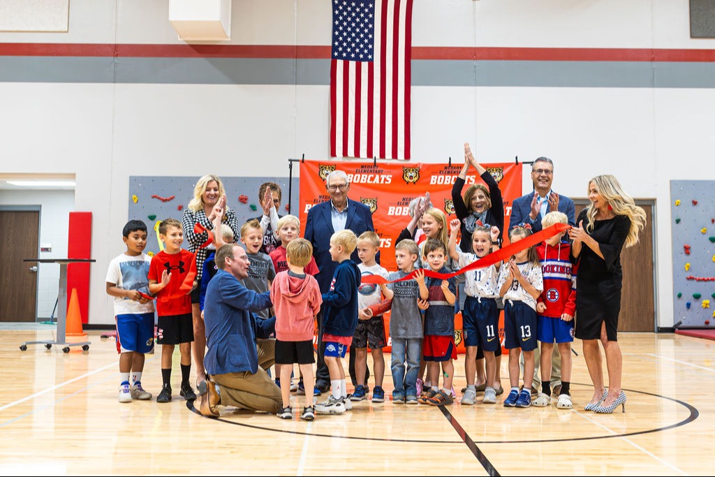 medary ribbon cutting