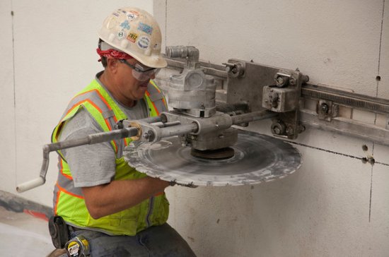 man working a saw