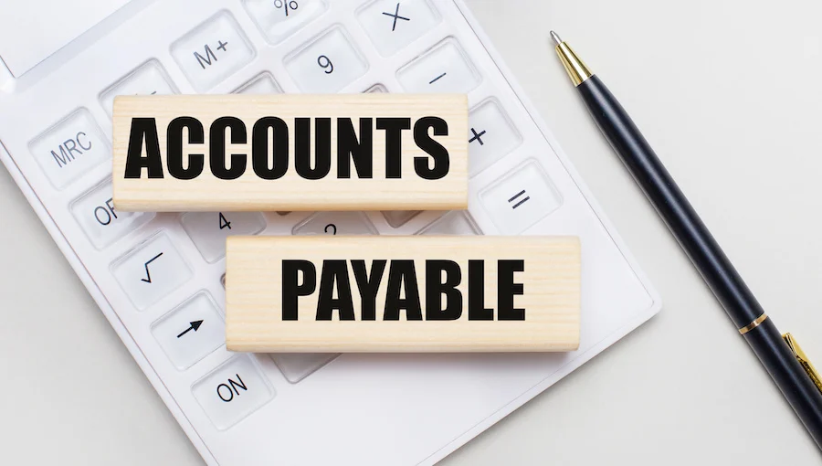 Accounts Payable logo on a calculator