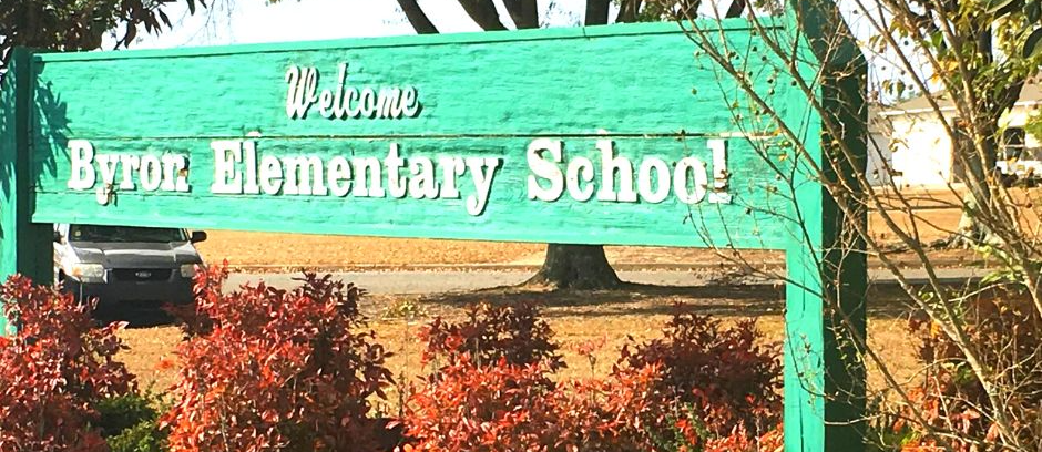 Welcome Byron Elementary School on a green sign