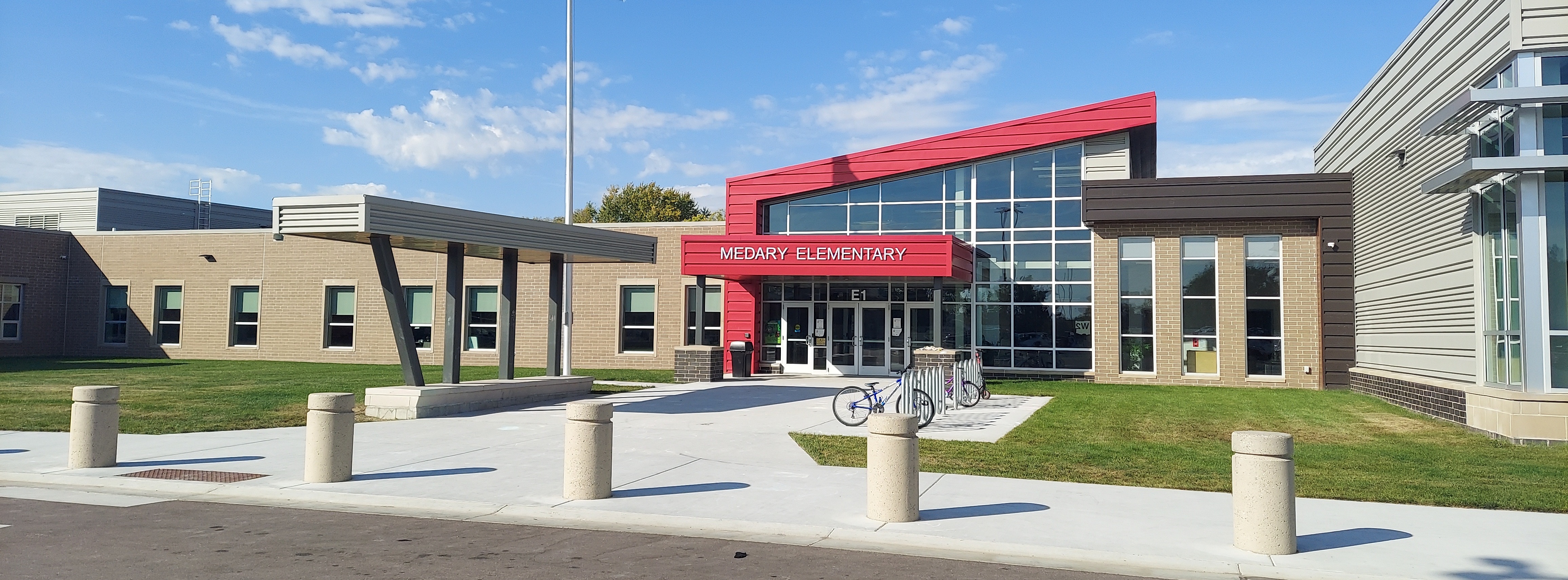 Image of Medary Elementary front entrance on a sunny day.