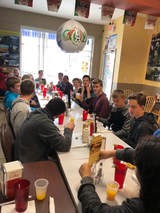 students sitting at lunch table