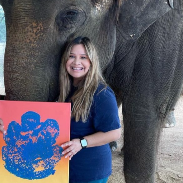 Mrs. Montemayor with an elephant