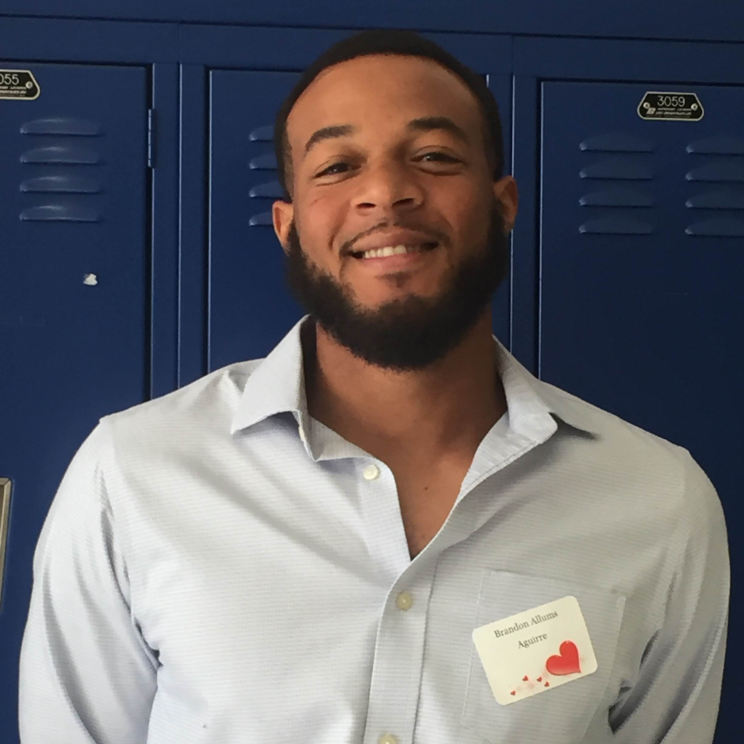Brandon Allums - headshot of teacher in professional dress