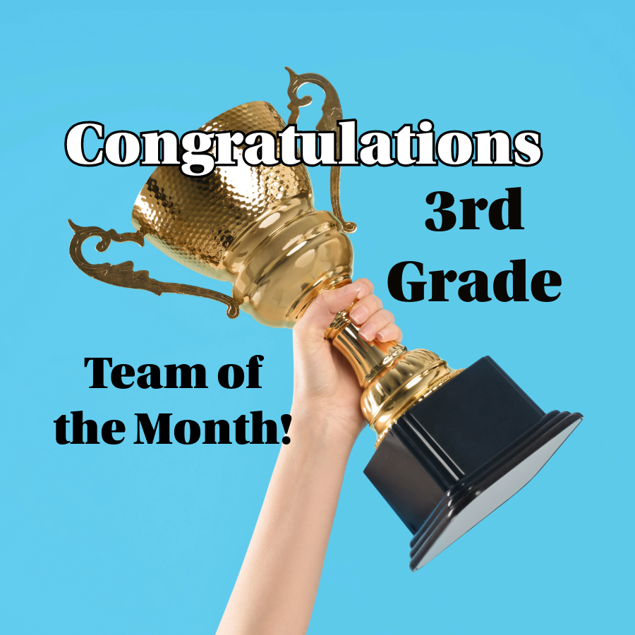 A hand holds a trophy aloft against a blue sky.  Words read: Congratulations to 3rd Grade Team of the Month
