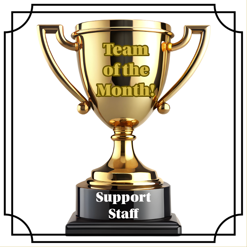 A trophy sits inside a decorative border.  Words on the cup of the trophy read :  Team of the Month.  Words on the trophy's bottom stand read:  Support Staff