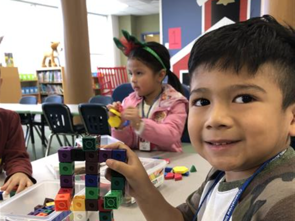 Student with block robot