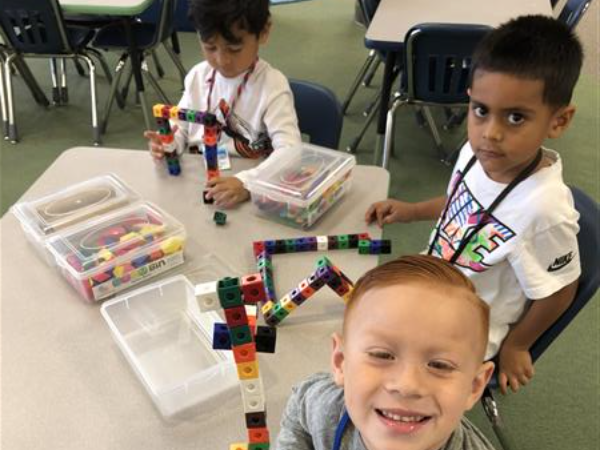 Student with block tower