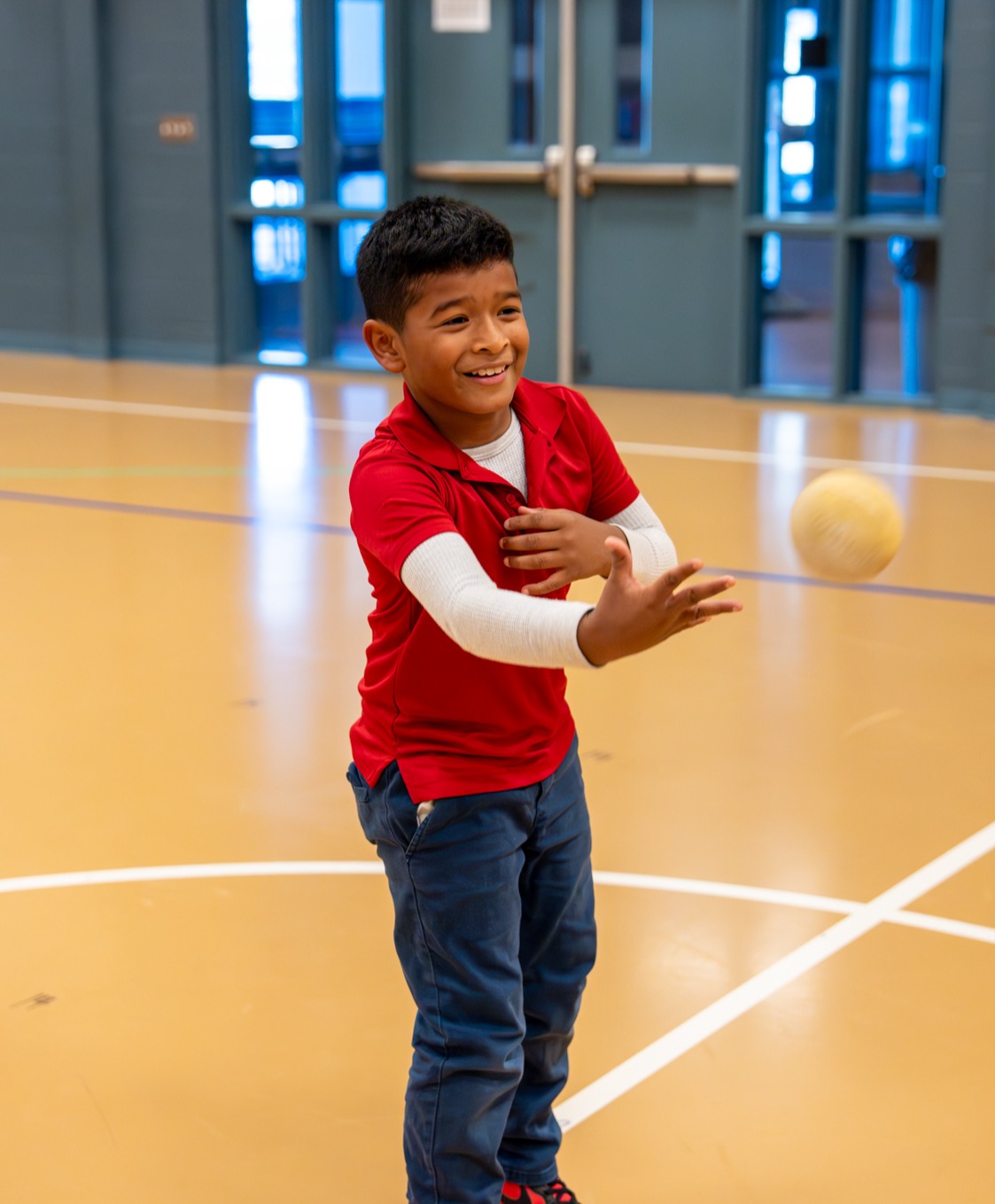 student playing with ball