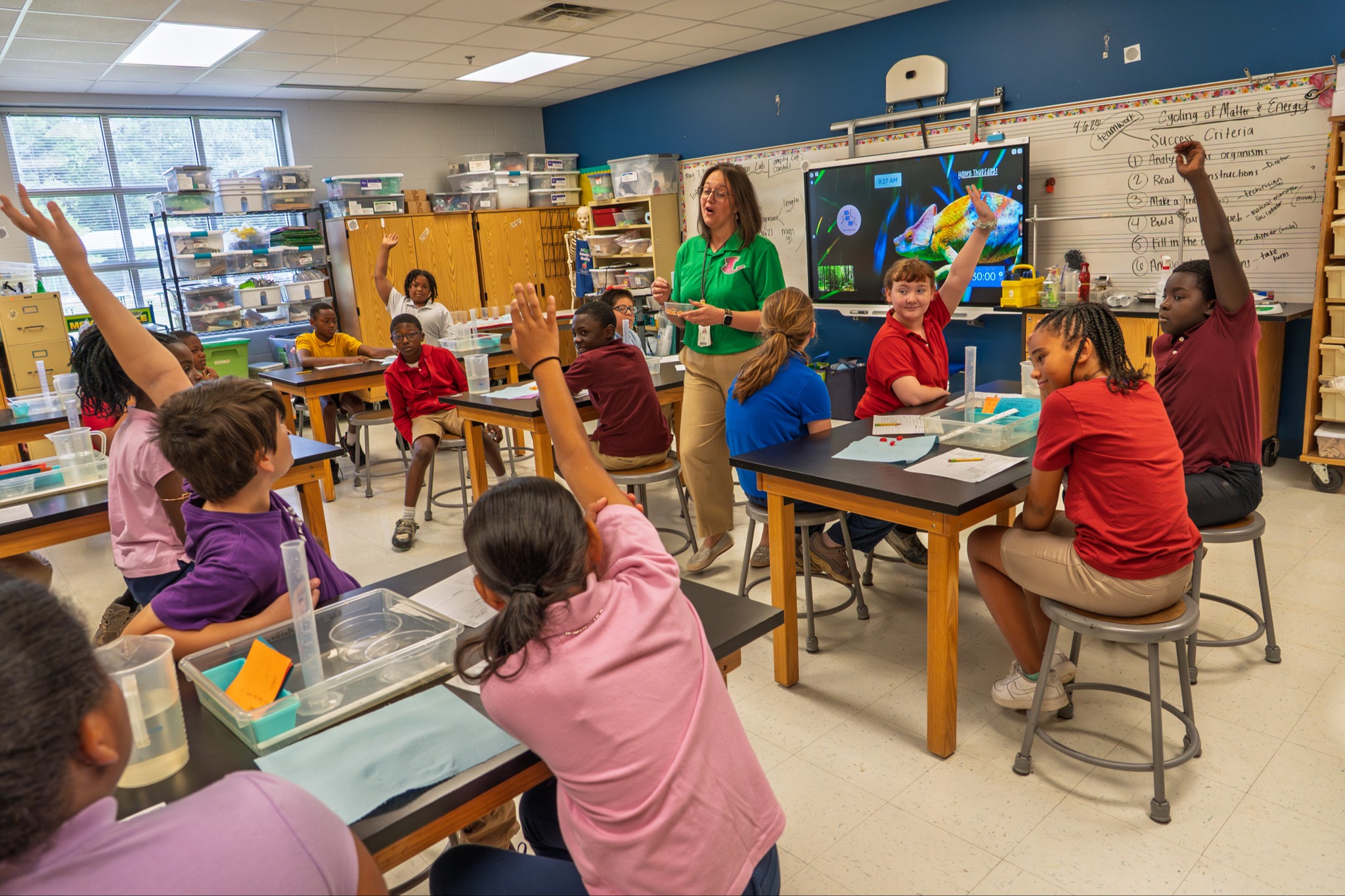 Teacher helping student