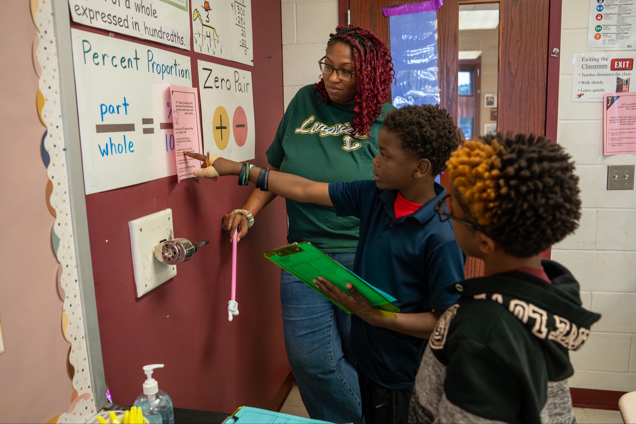 students working with teacher