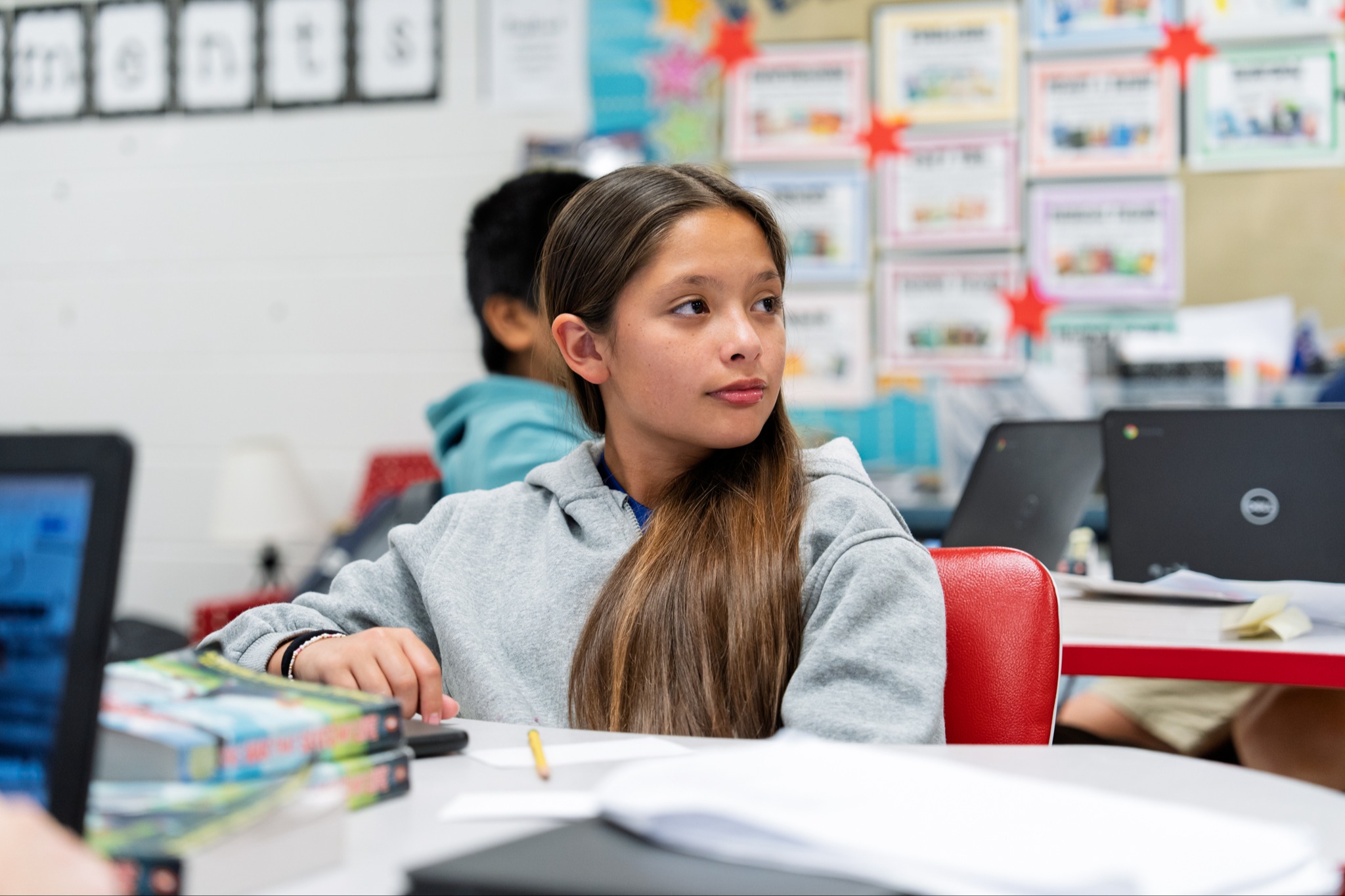student listening to the teacher