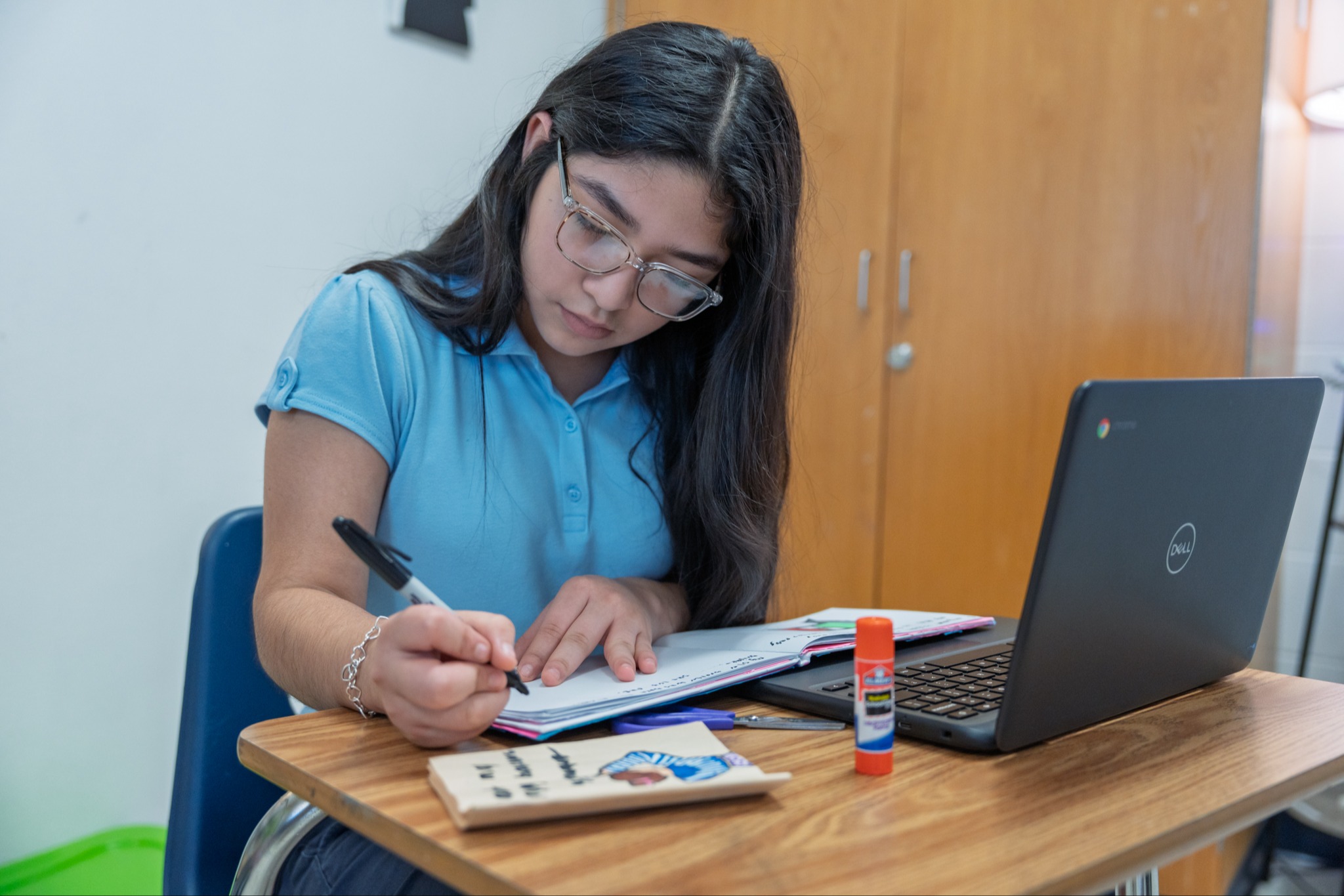 student working on a project