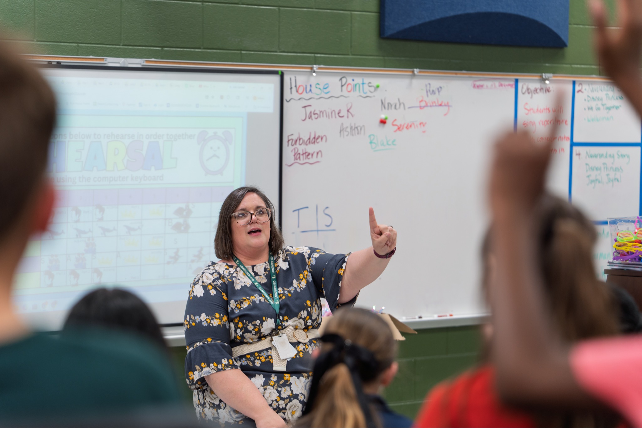 teacher helping student