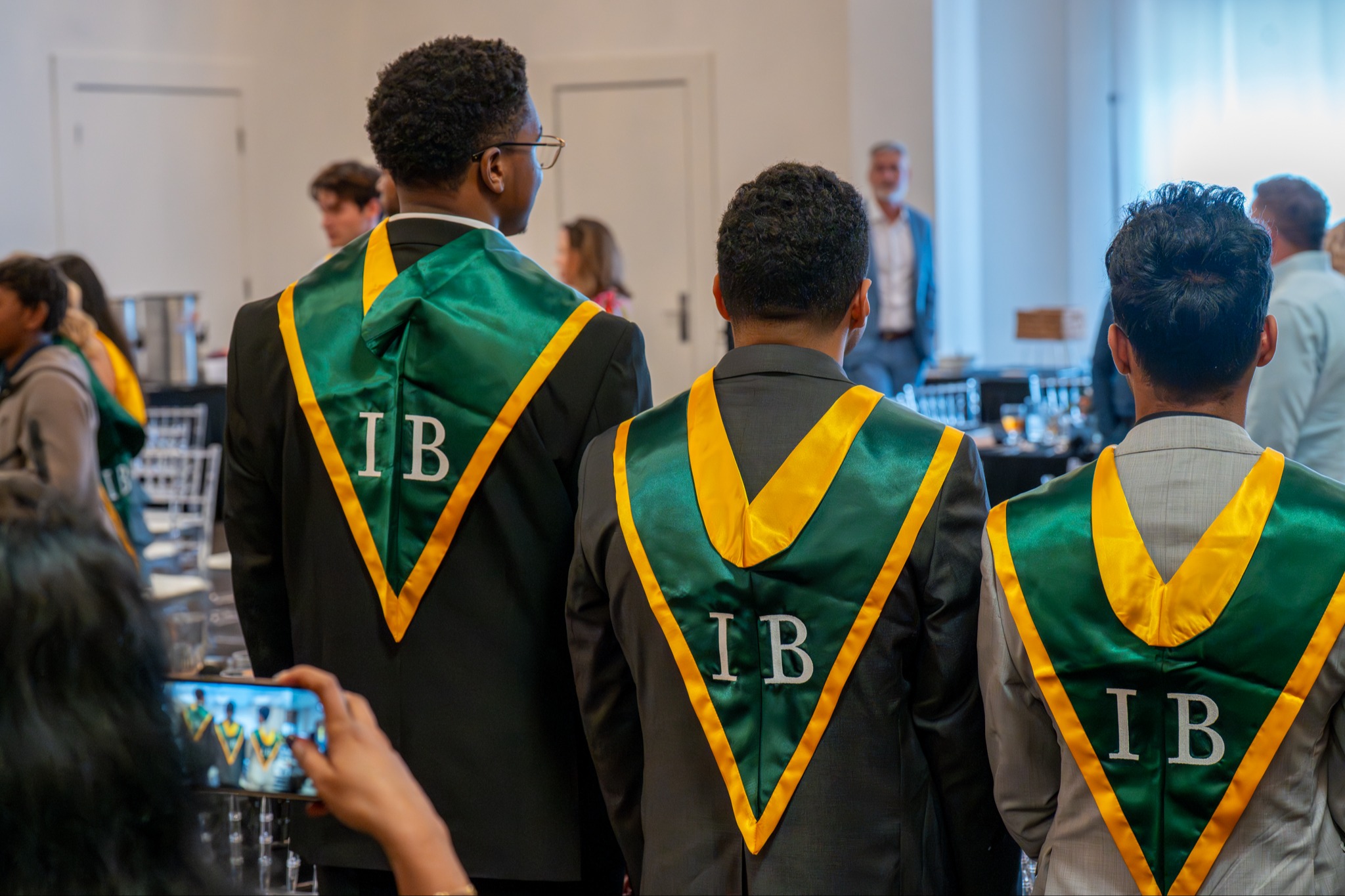 students with IB robes