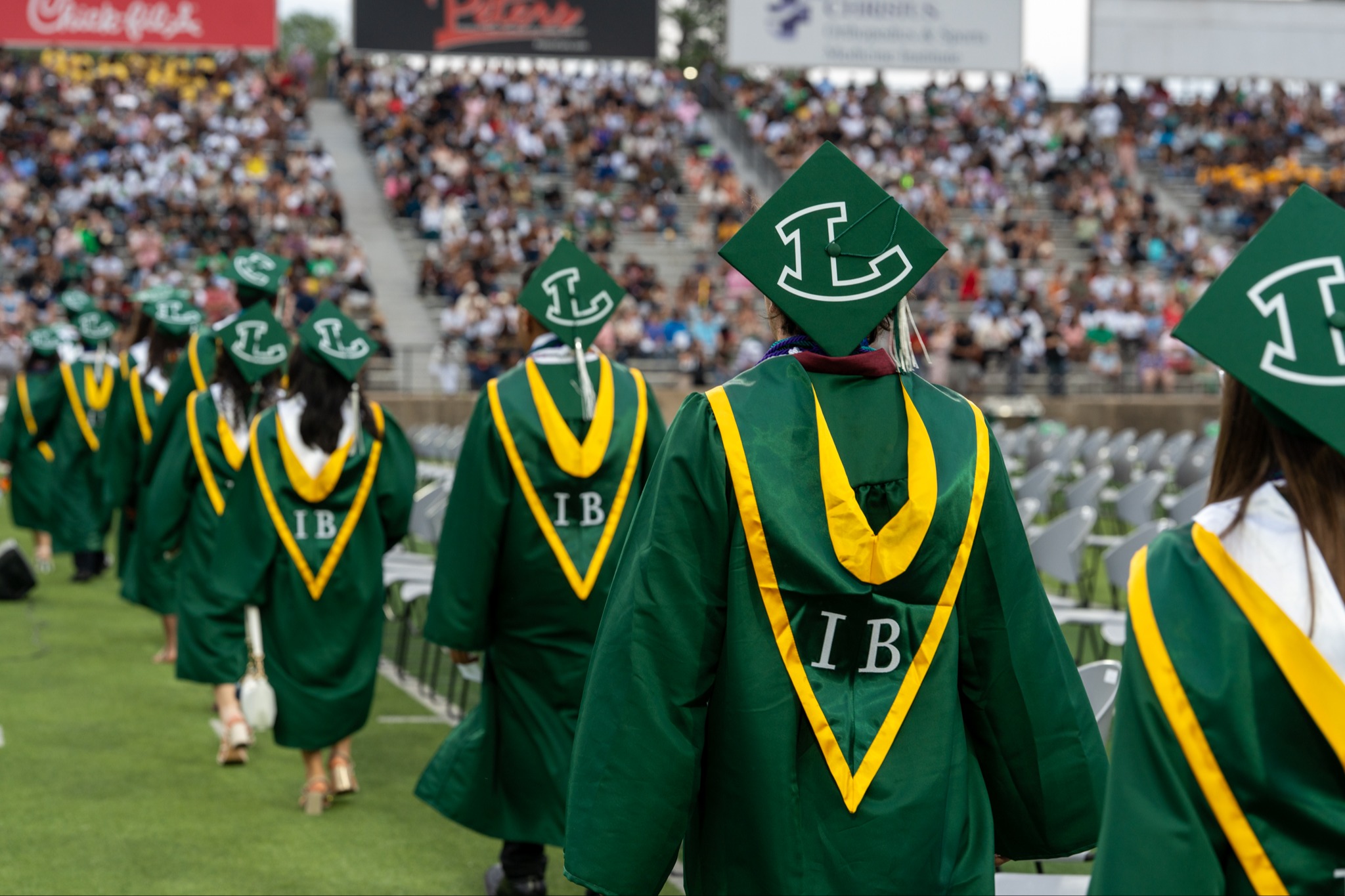 students in IB robes