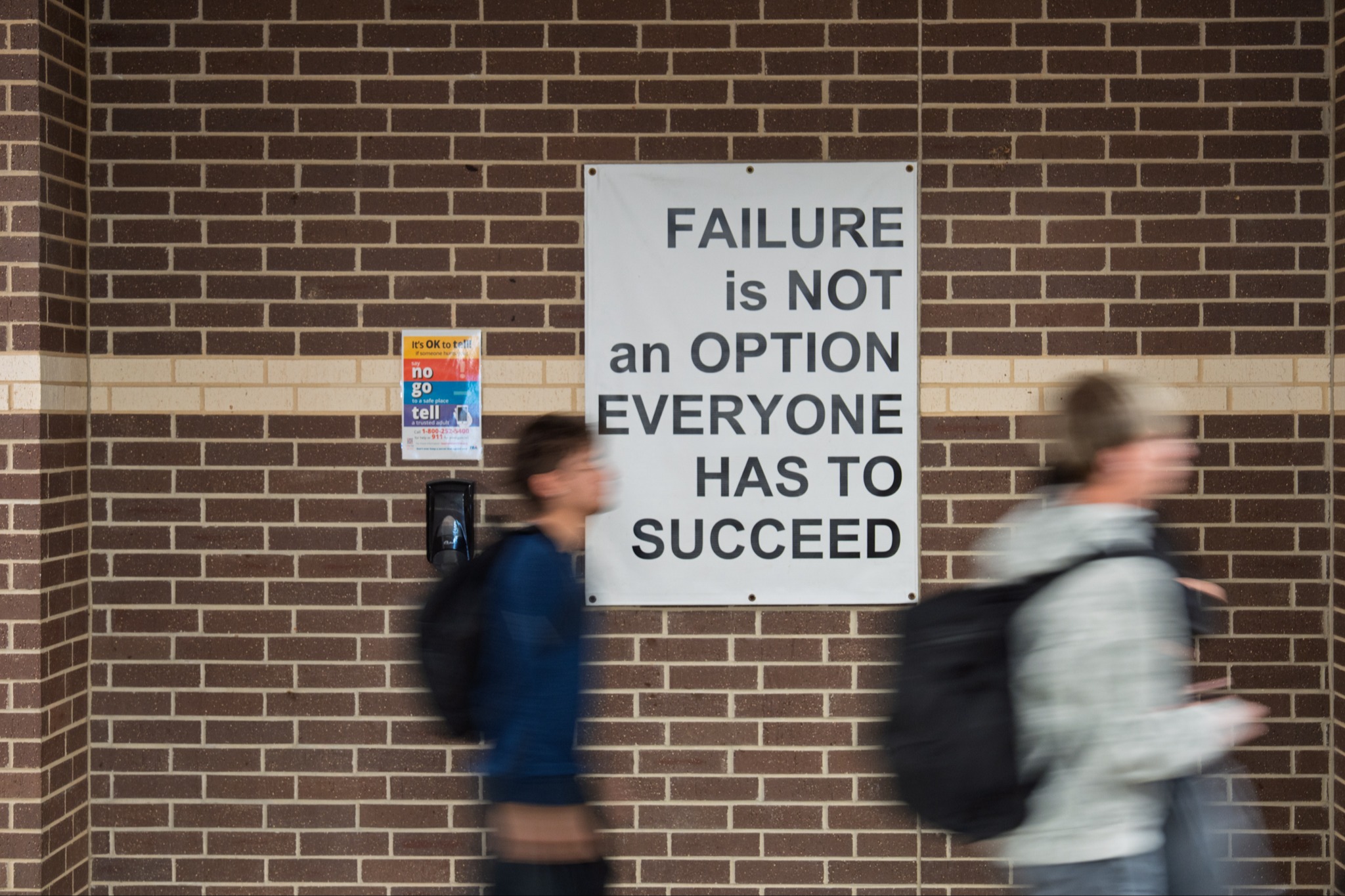 students walking through the hall