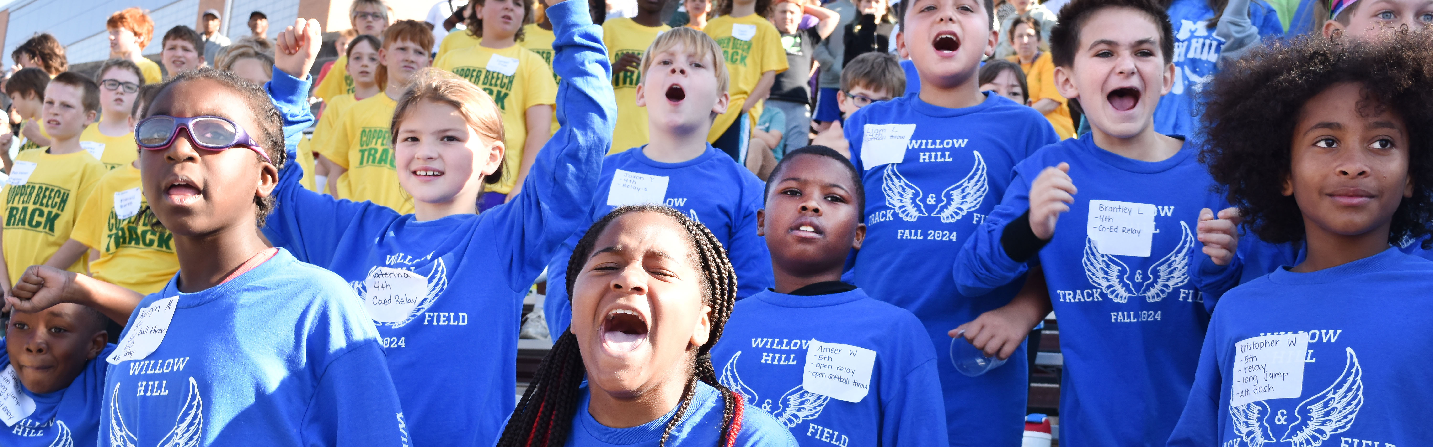 Willow Hill students cheer for their team members at the Elementary Track &amp; Field Meet