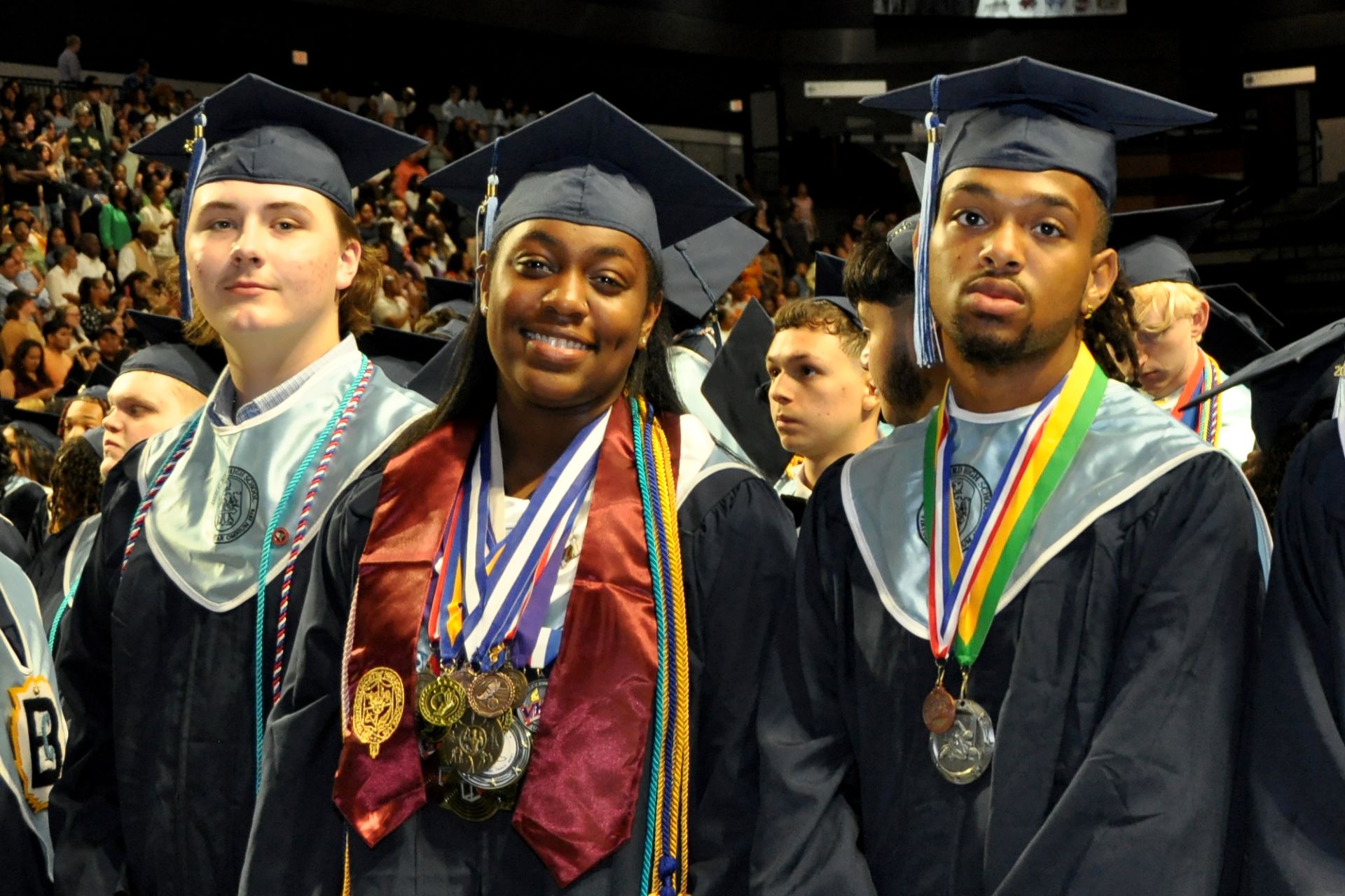 Three graduates