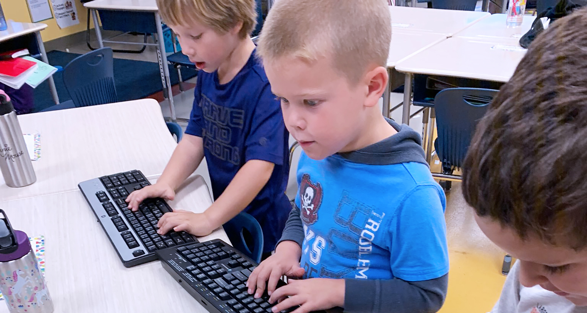 kids with Chromebooks