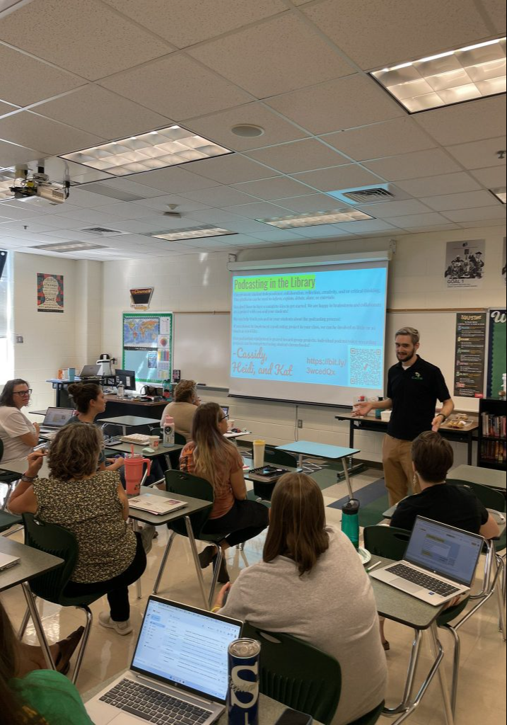 A teacher lecturing his students in class