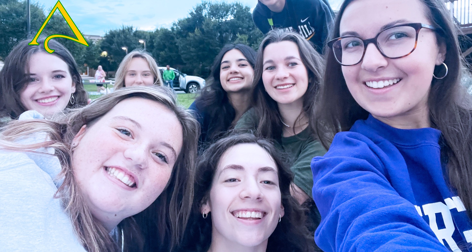group of students pose for a selfie