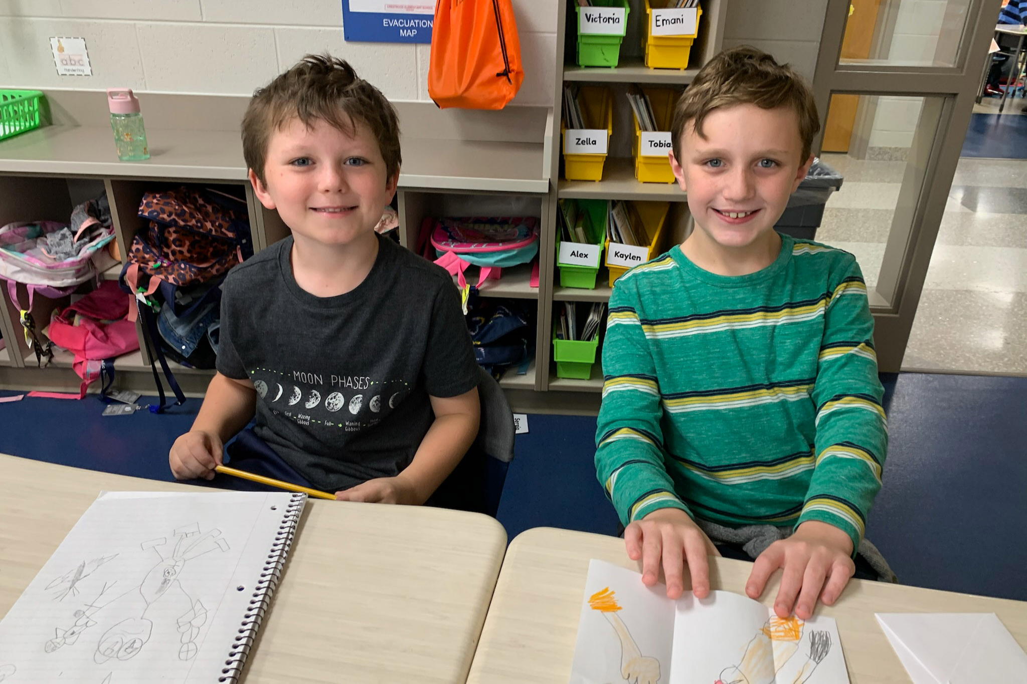 Two male students smiling for the camera