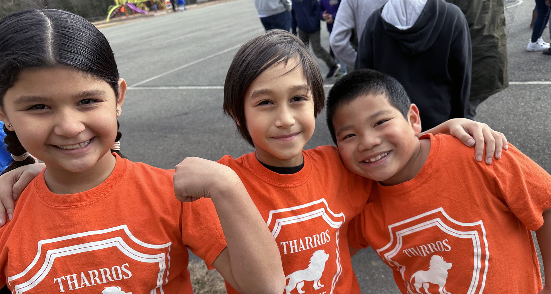 Three students in matching tshirts