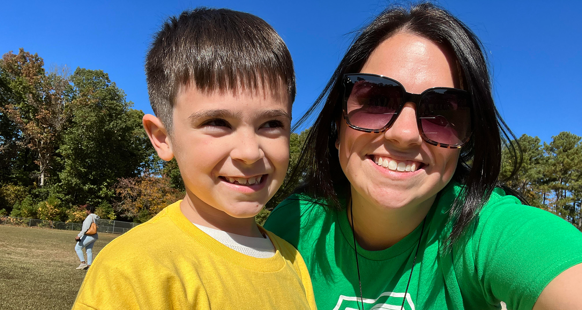 Student poses with teacher