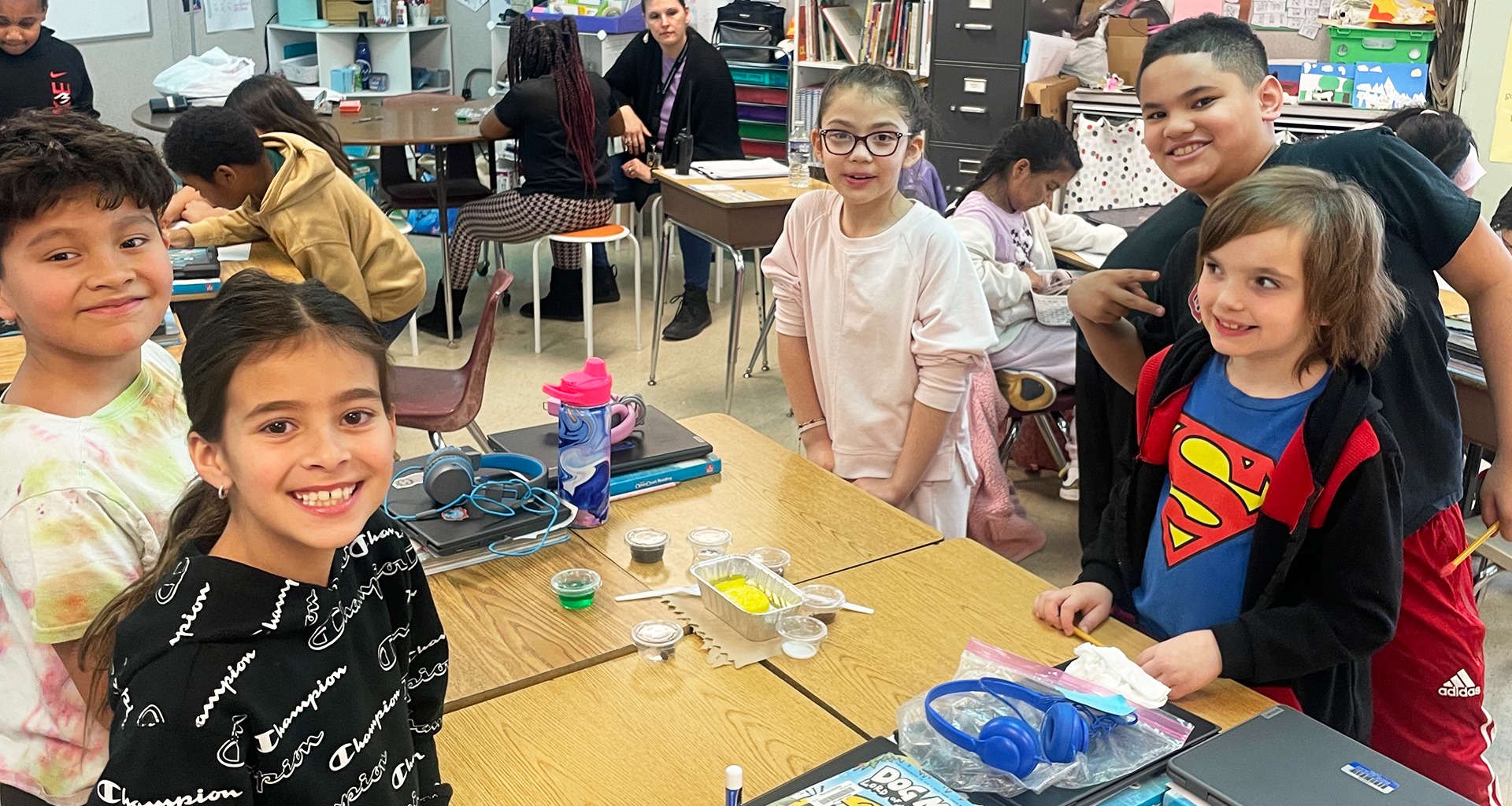 a group of students smile for a photo