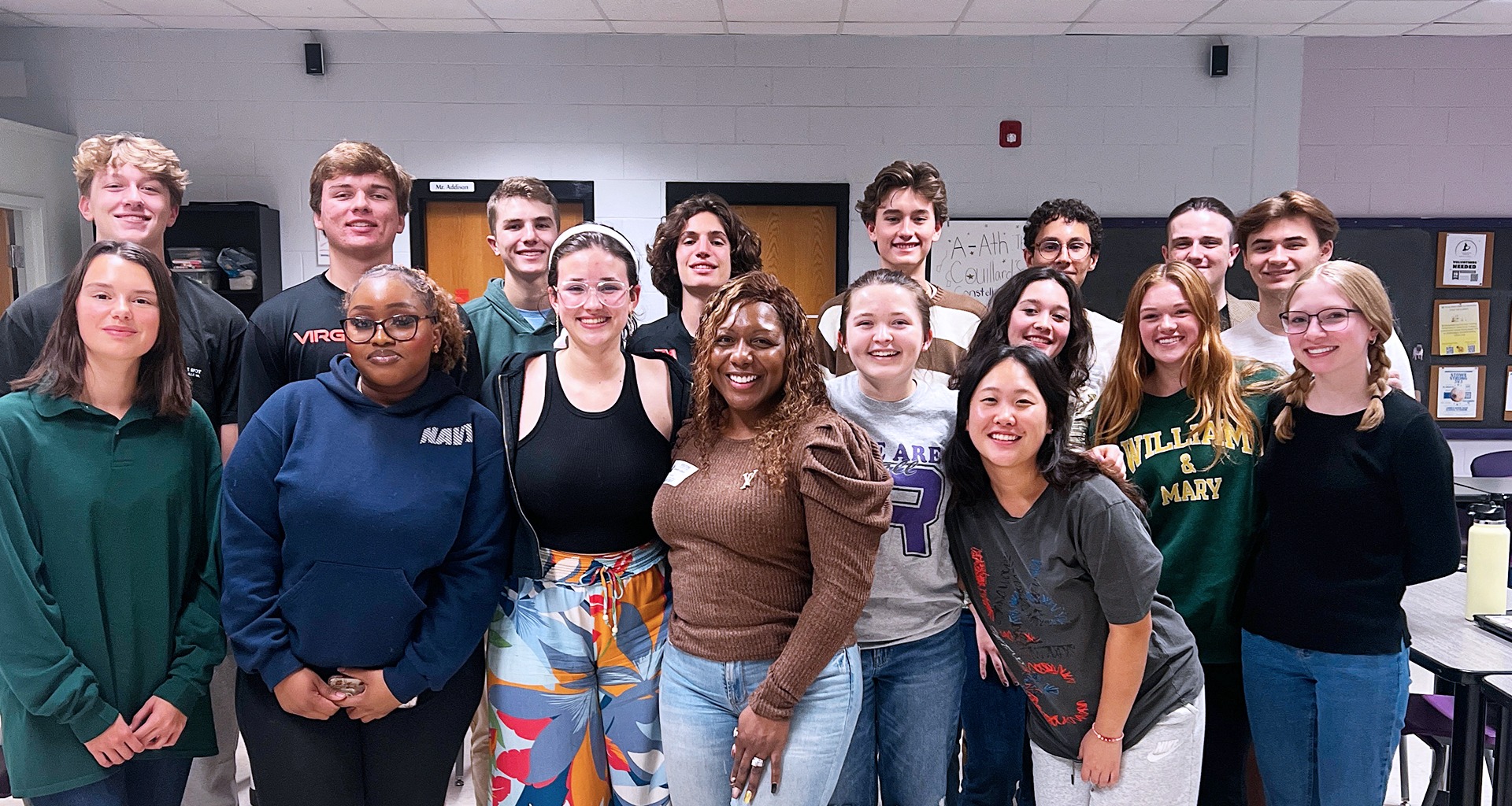 Students pose in classroom