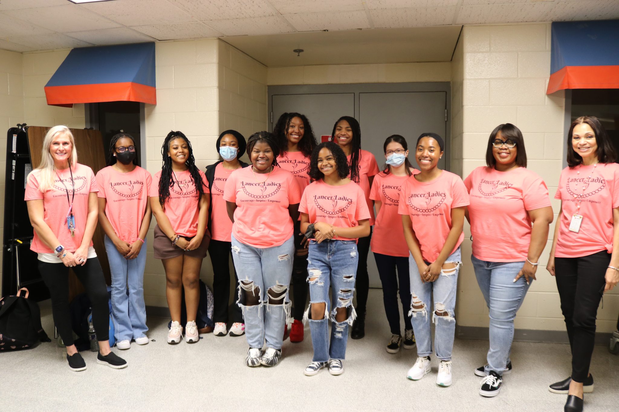 Members of the Lancer Ladies Club pose for a photo all together