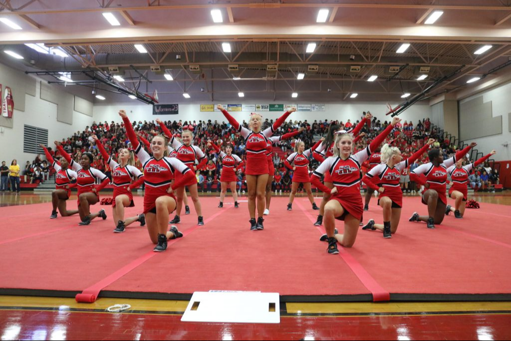 Cheerleaders during a performance in the school gymnasium