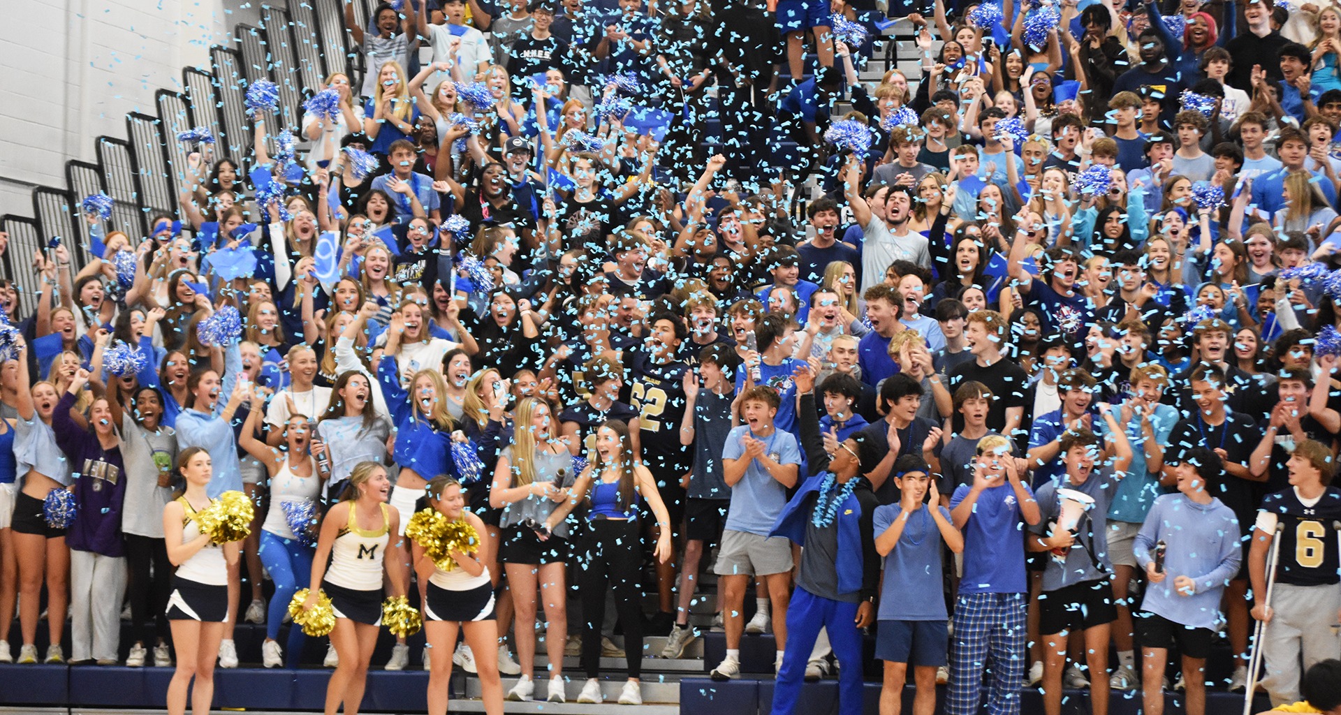 students cheering in the gym
