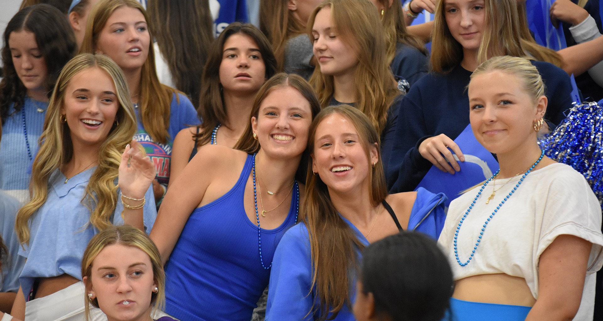group of students smile for the camera
