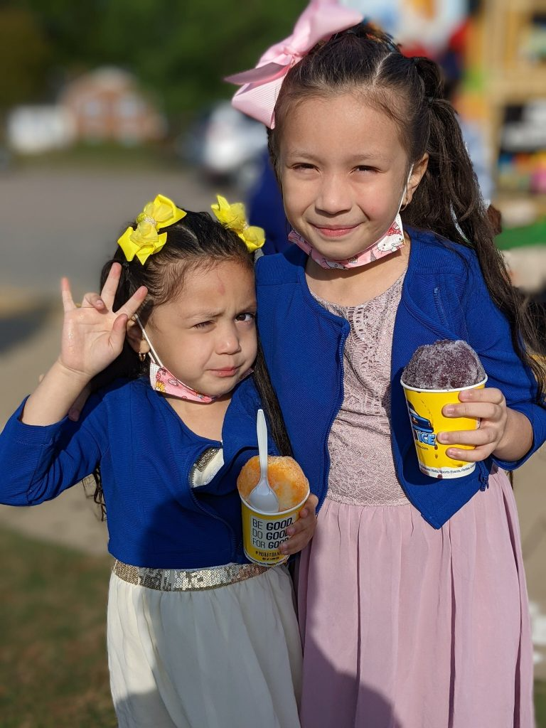 Two girls eating shaved ice