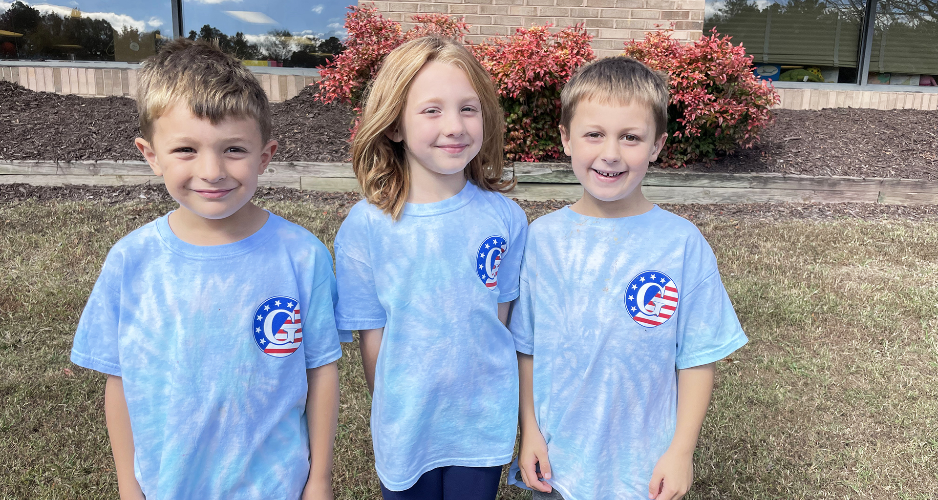 Three students wearing the Gordon Elementary tshirts.