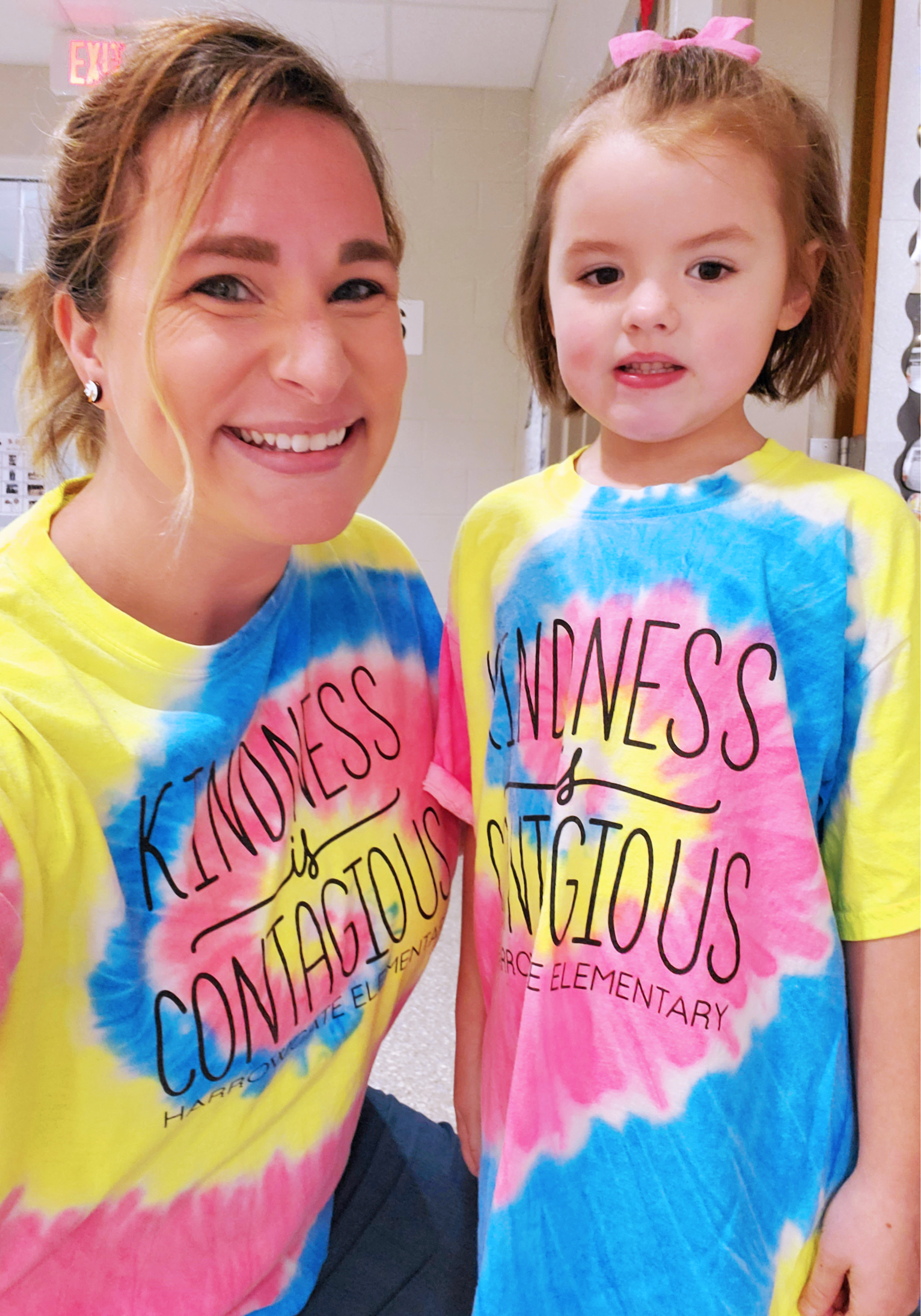 Teacher and student in matching kindness tshirts