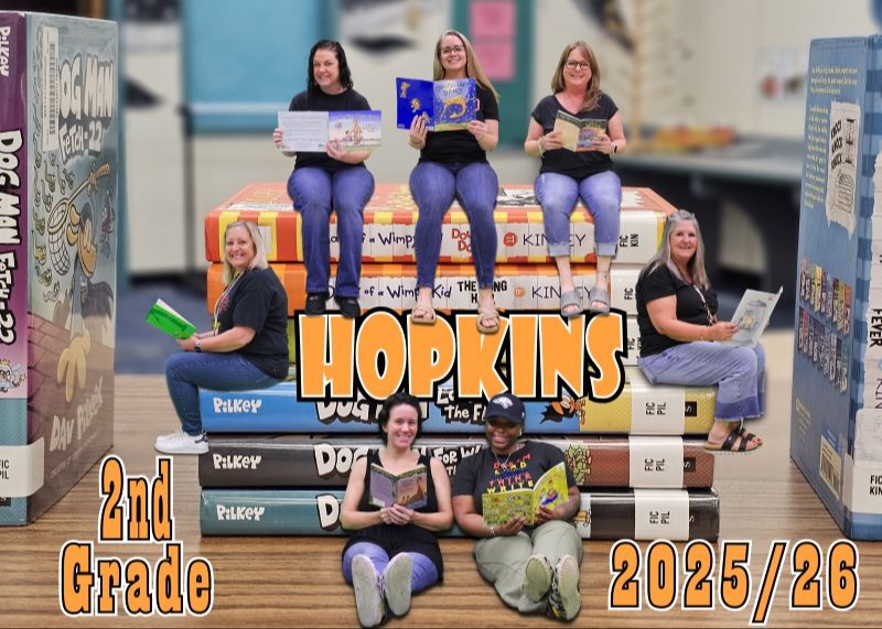 Hopkins teachers in a thematic pose