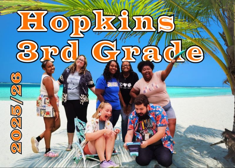 Hopkins teachers in a thematic pose