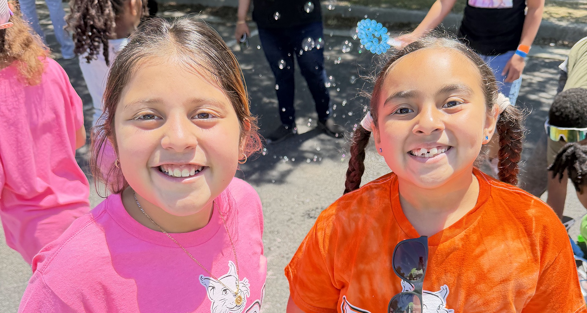 two students smile for a photo