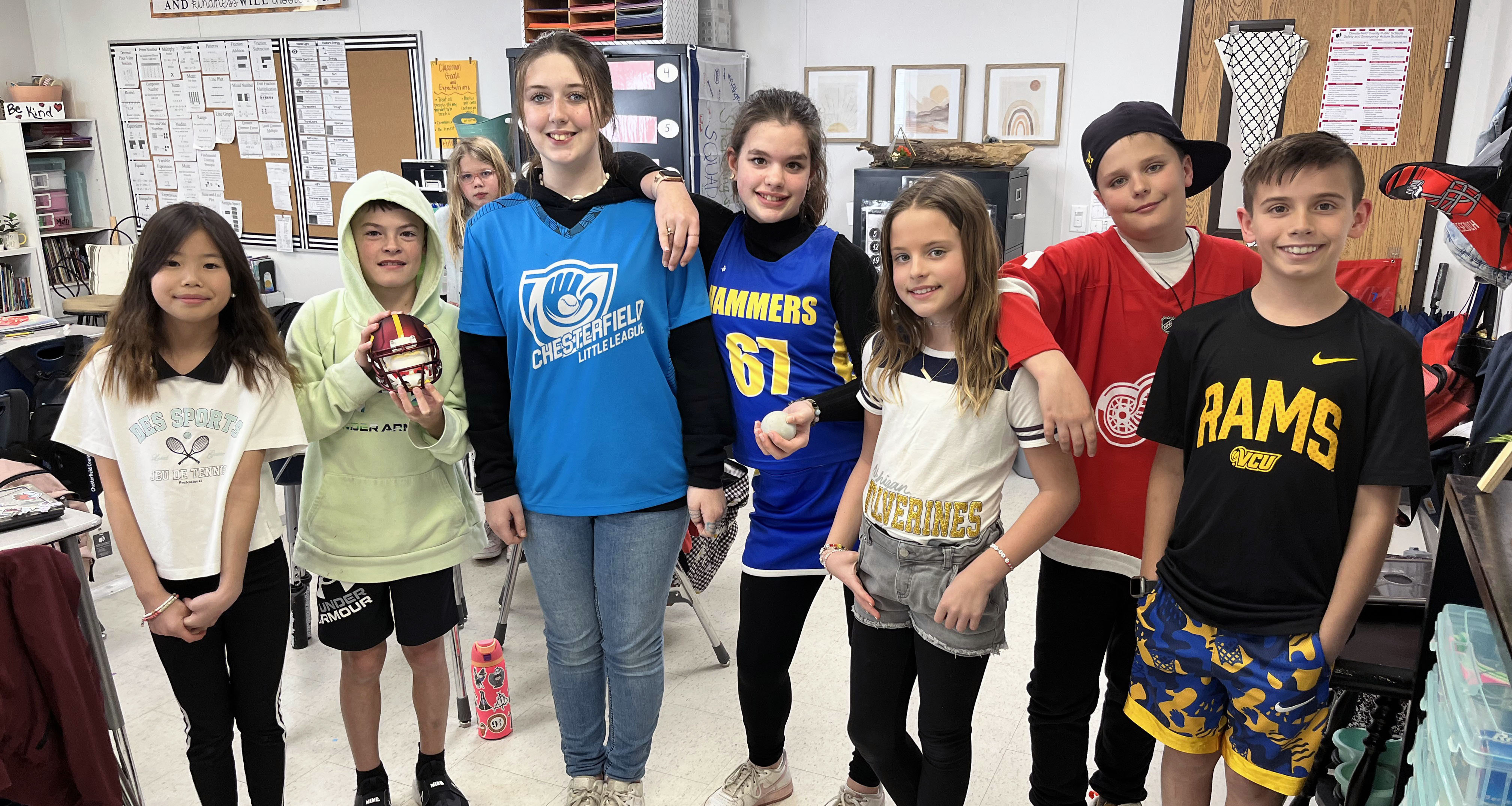 Group of students posing in their team gear.