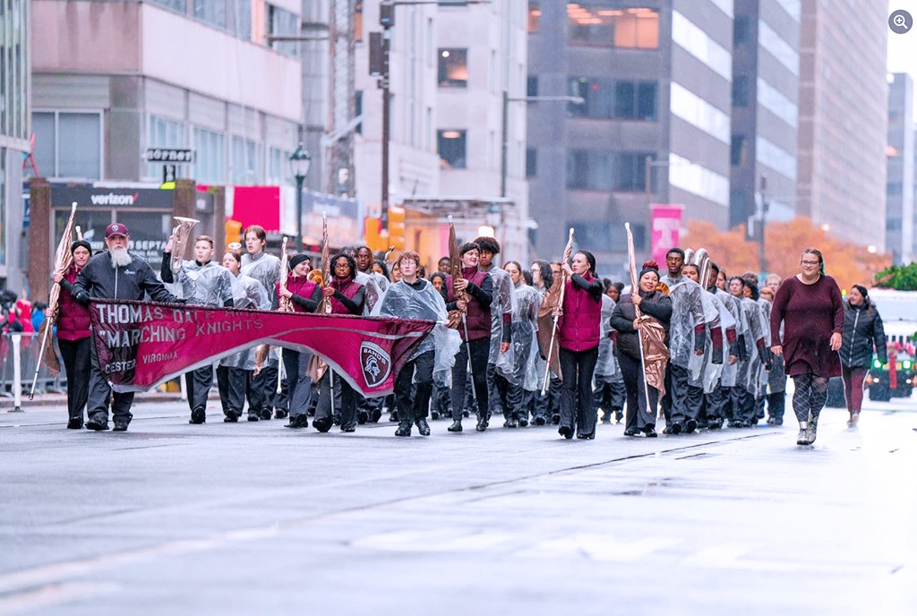 Band marches down a city street
