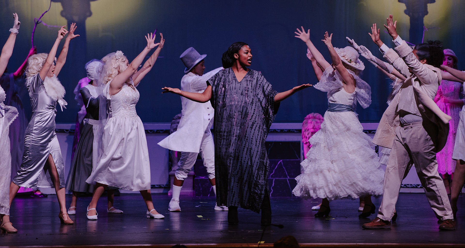 Students on stage during play