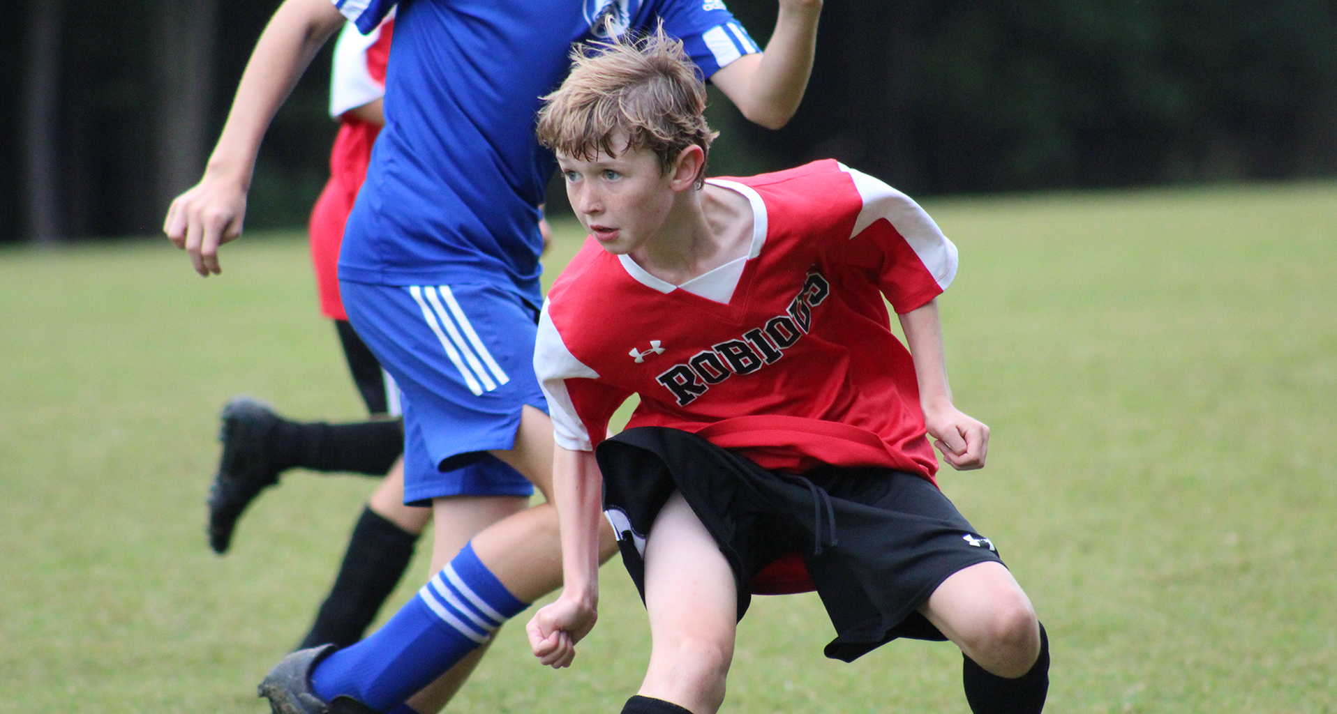 Boys soccer team in action on the field