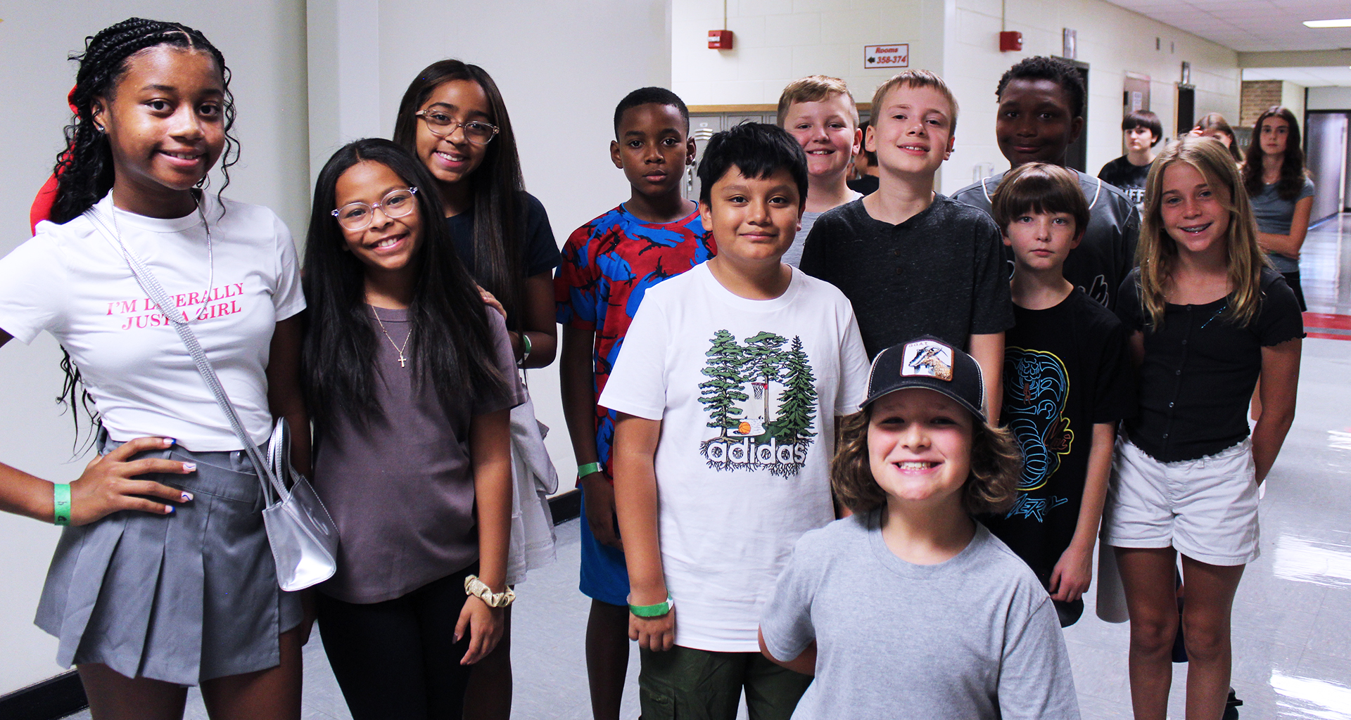 Large group of students pose for a photo