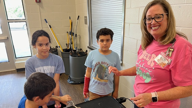 students cooking for Cooking club