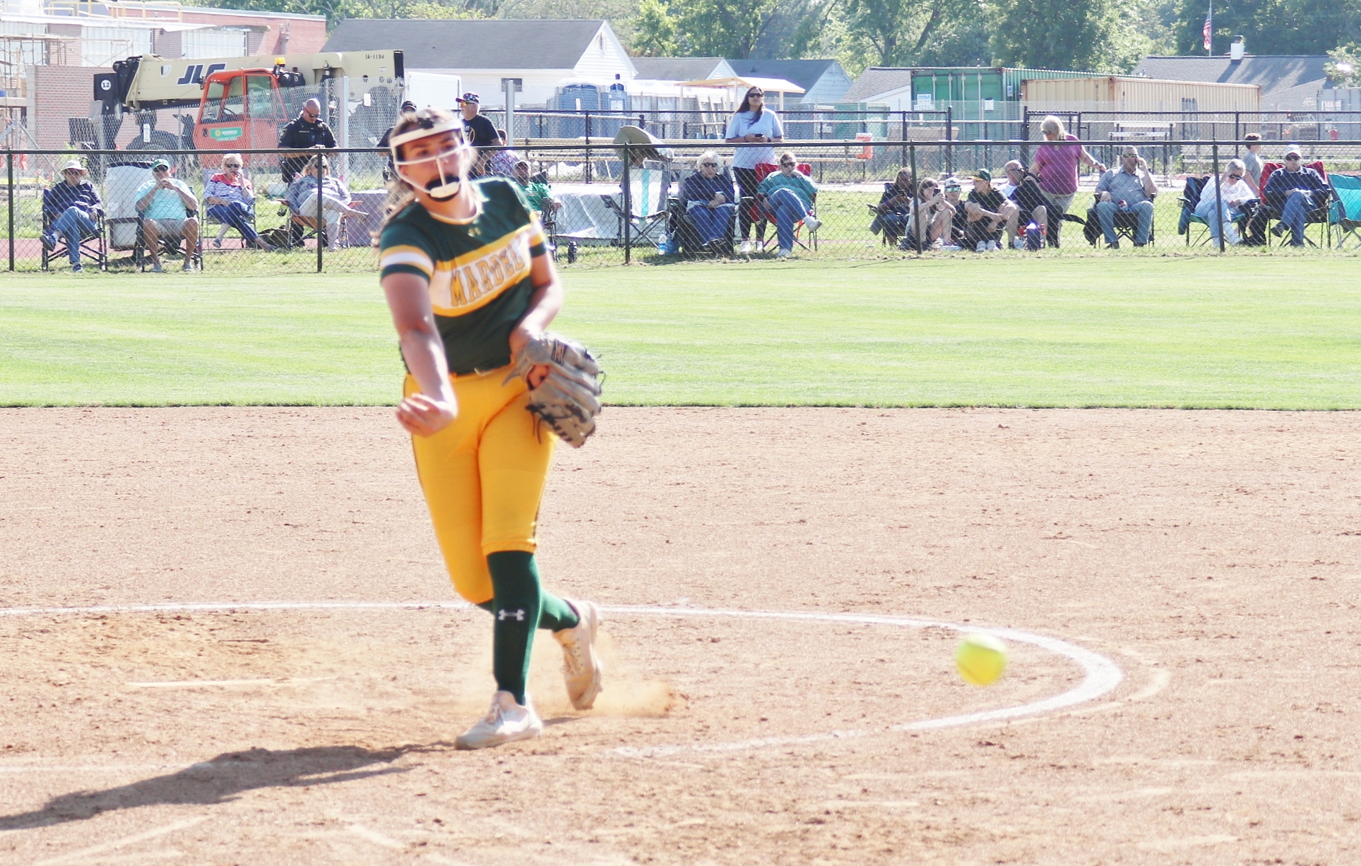 Mardela player throws pitch during softball game